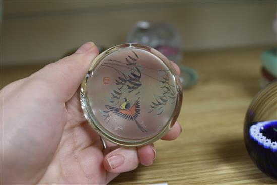 A collection of six paperweights